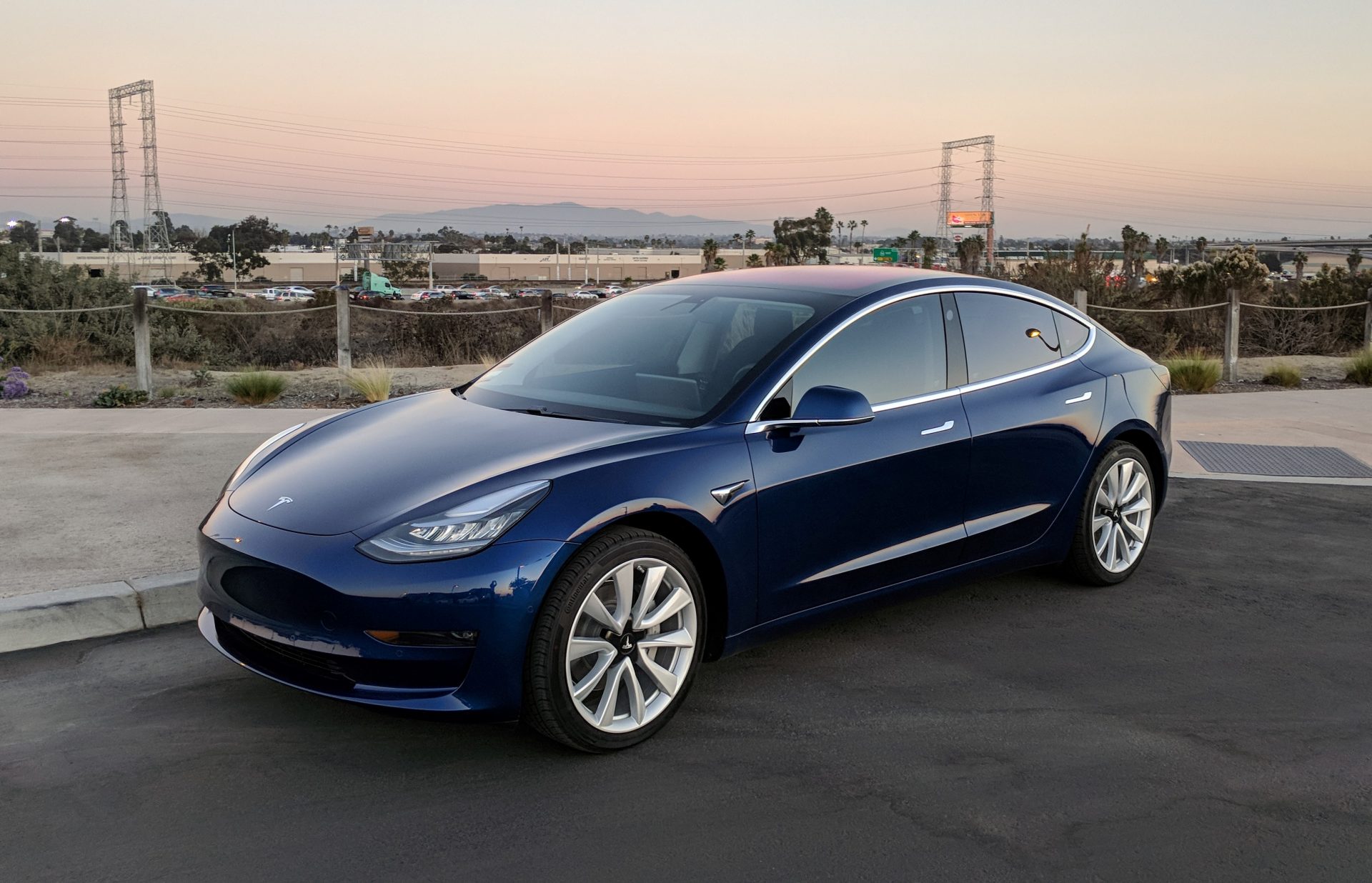 "Tech Titans": Investigating the latest technological features in sedans, focusing on models like the Tesla Model 3.