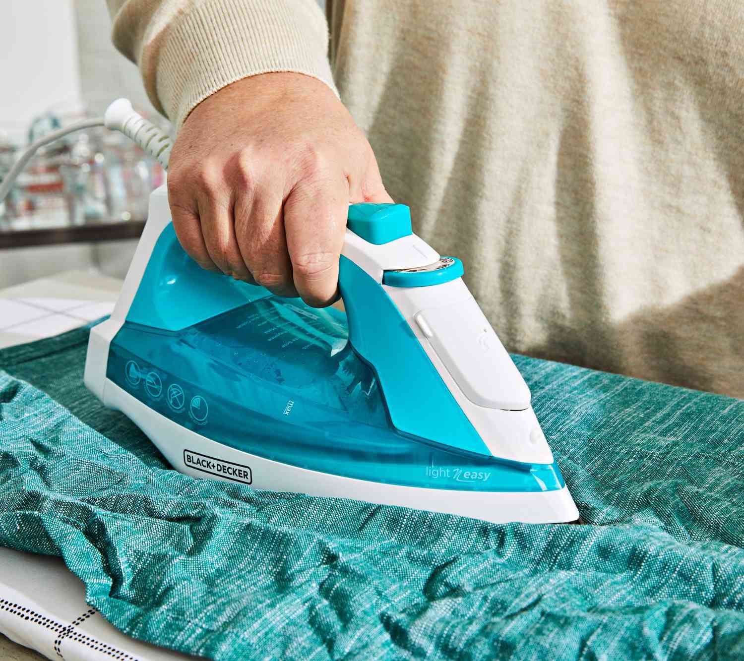 Dual Functionality: Iron and Steam with Ease Using the Black+Decker IR1010 Light 'N Easy Compact Steam Iron